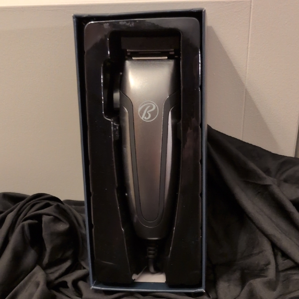 Bally's black Electric Hair Clipper With All Attachments.